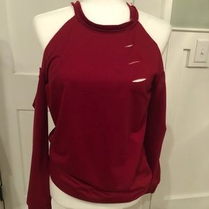 Cute cold shoulder slashed sweatshirt.